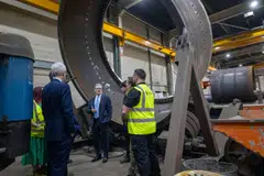 Britain's Prime Minister Keir Starmer (centre) at a factory that makes renewable-energy components in England, in July.