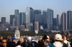 The new JPMorgan building will be in Canary Wharf (above), and will contribute £9.9 billion over six years to the local economy.