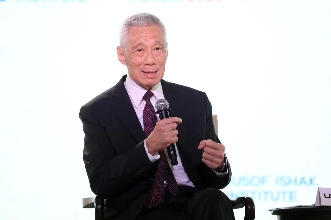 Singapore's Senior Minister Lee Hsien Loong speaking at the Iseas-Yusof Ishak Institute’s Regional Outlook Forum in Singapore on Jan 8.