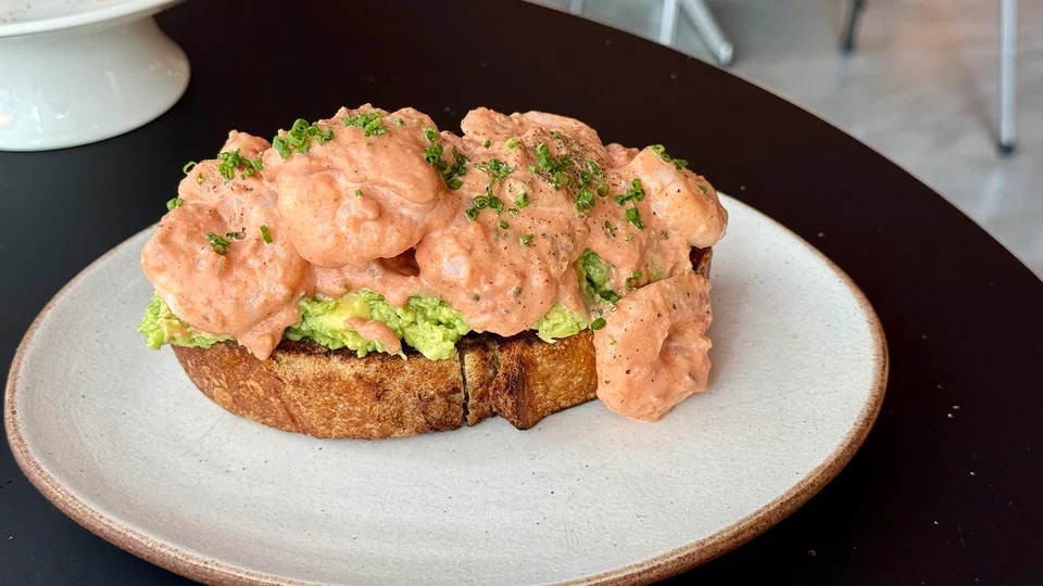 Prawn and avocado open-face sandwich.