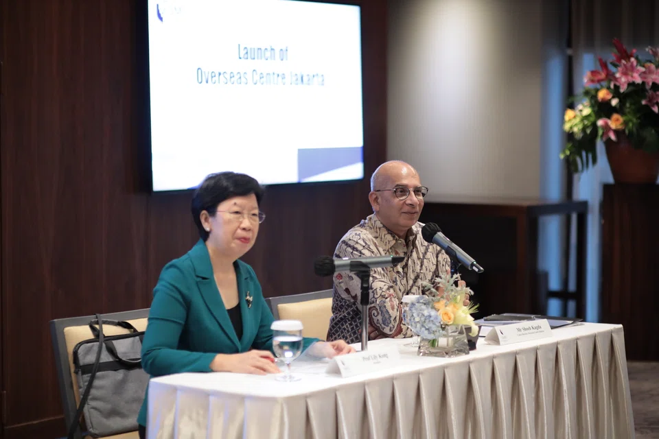 SMU President Lily Kong (left) with Shoeb Kagda, the centre director of SMU's first overseas centre in Jakarta, at a media conference on Dec 6, 2022.
