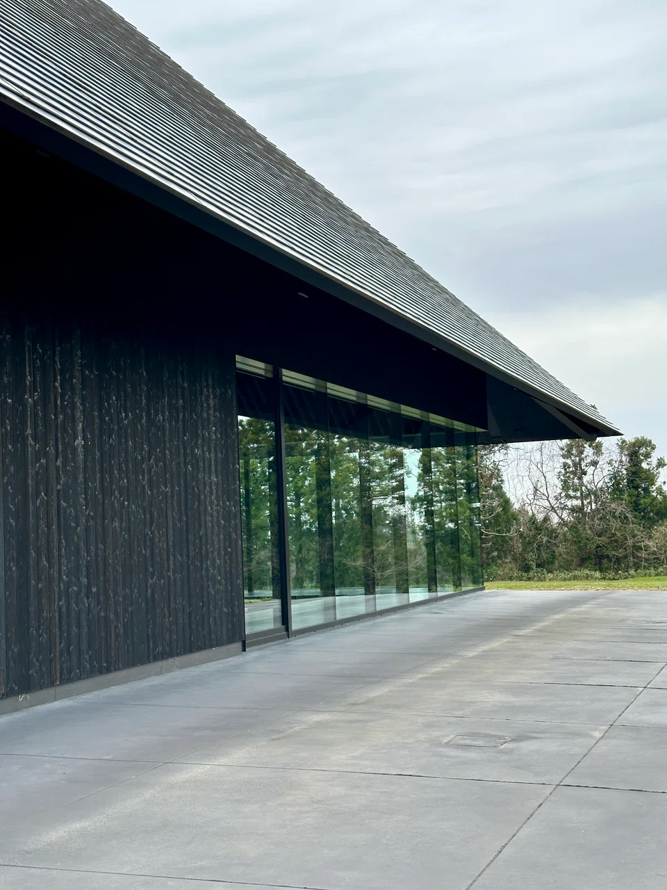 Iwa Sake's Kengo Kuma-designed brewery sits in the bucolic surroundings of Shiraiwa village in Toyama.