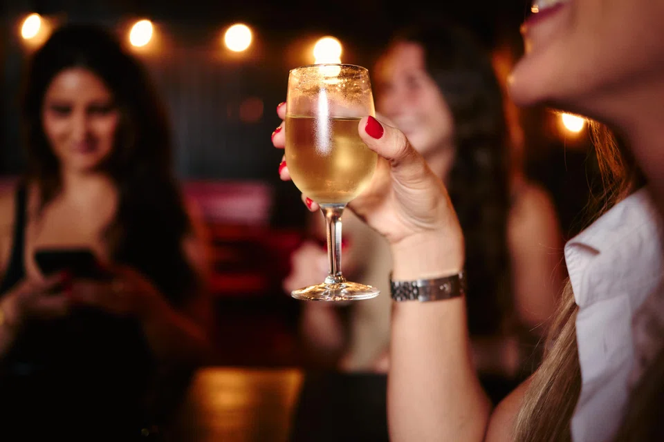 Julie Duijm drinking wine at Frog, a wine bar in Brooklyn, on Sep 14. 