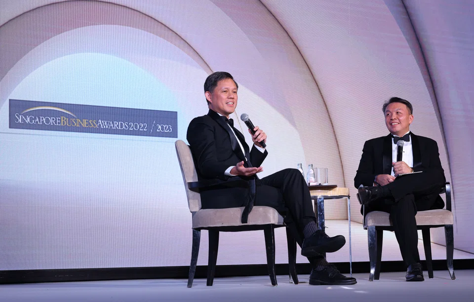 (From left) Chan Chun Sing, Minister for Education and Christopher Ong, senior vice-president and managing director of DHL Express Singapore, at a fireside chat at the 38th Singapore Business Awards. Chan says businesses should think about how they can equip their people with the necessary skill sets at both scale and speed.