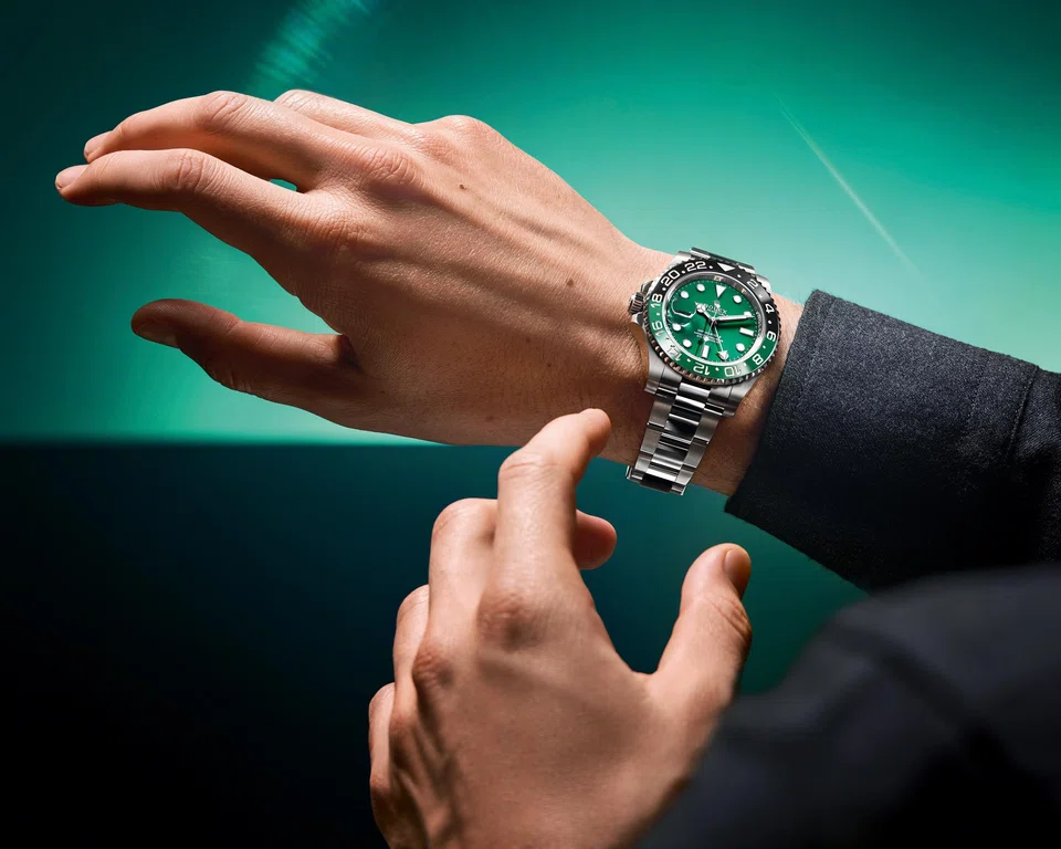 The Rolex Oyster Perpetual GMT-Master II in 18 carat white gold is celebrated alongside its predecessors at the exhibition.