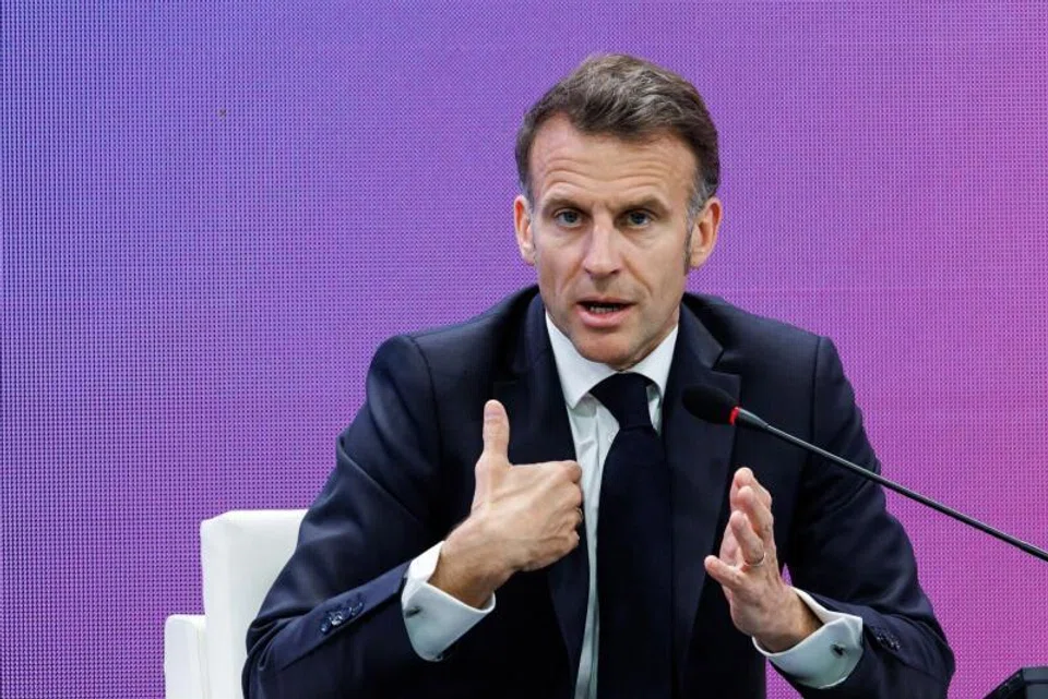 Macron (top) said after Friday’s summit that the countries, both major arms manufacturers, would strive to boost their defence ties.