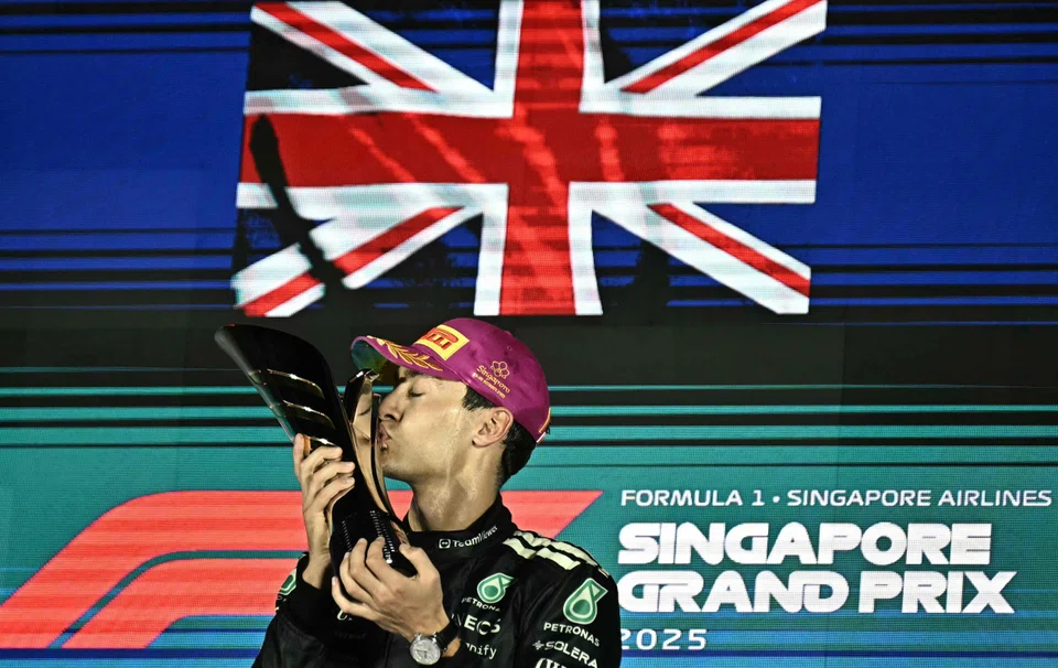 George Russell drove a flawless race from pole position to win the Singapore Grand Prix for Mercedes on Sunday.