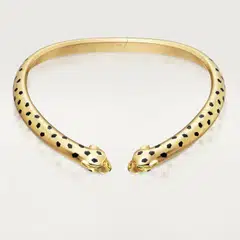 Panthere necklace in yellow gold with black lacquer, onyx and tsavorite garnets. 