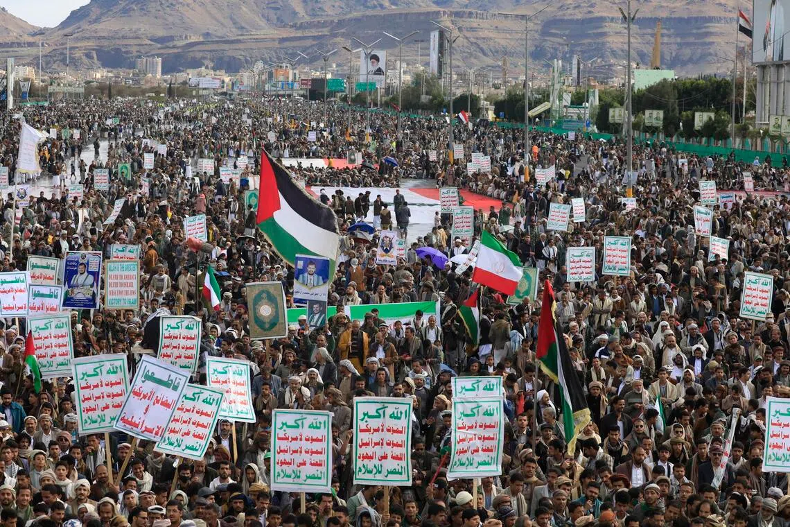 Houthi supporters taking part in a rally in solidarity with Iran in Sanaa, Yemen, on Mar 27. The Houthis carried out a second strike on Israel, with more to come, says a Houthi military spokesperson.
