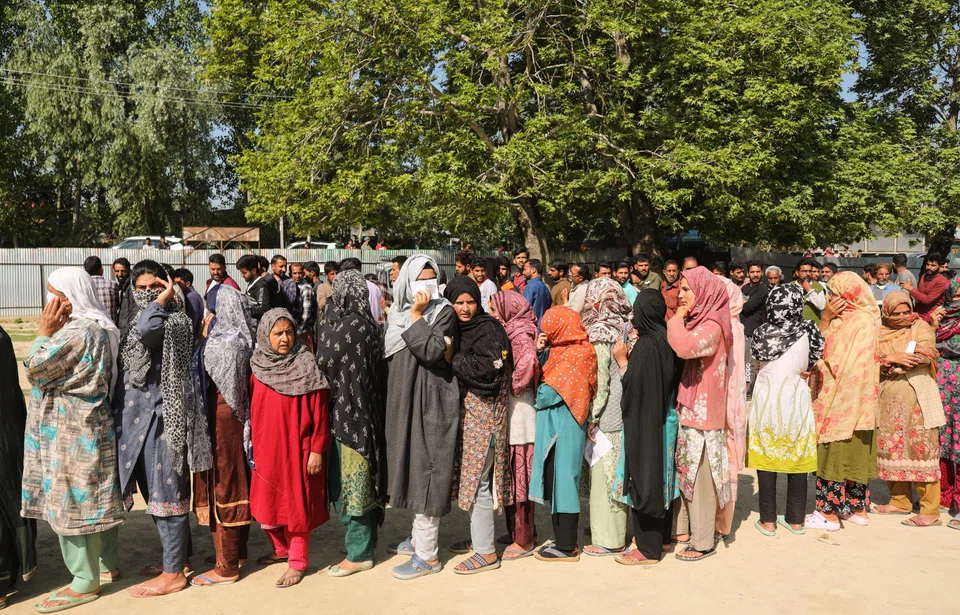 Kashmiri people awaiting their turn to vote in the fifth phase of the Indian general elections in Shadipora, Sumbal area of Bandipora district, north of Srinagar, May 20. The Indian general elections are held in seven phases between April 19 and June 1, 2024.