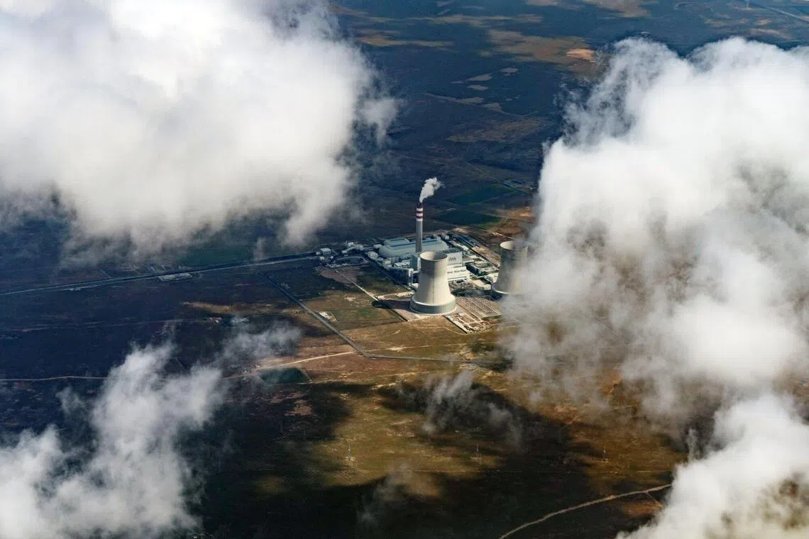 A coal-fired power plant in Yinchuan,  China, Sep 17, 2025. The projected 2030 production of coal, oil and gas exceeds levels consistent with achieving the 1.5 deg C target by more than 120 per cent, a report found.