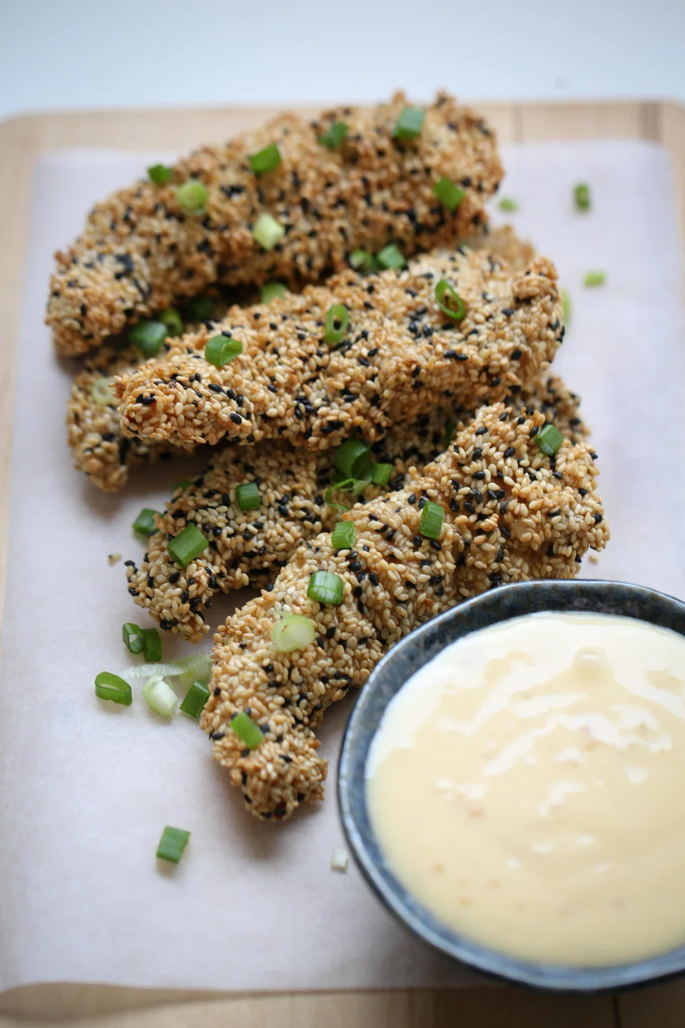 Sesame-crusted chicken tenders. Unlike nuggets, tenders are a single piece of meat, formed from tenderloin, the pectoralis minor muscle, found beneath the breast but smaller and thinner.