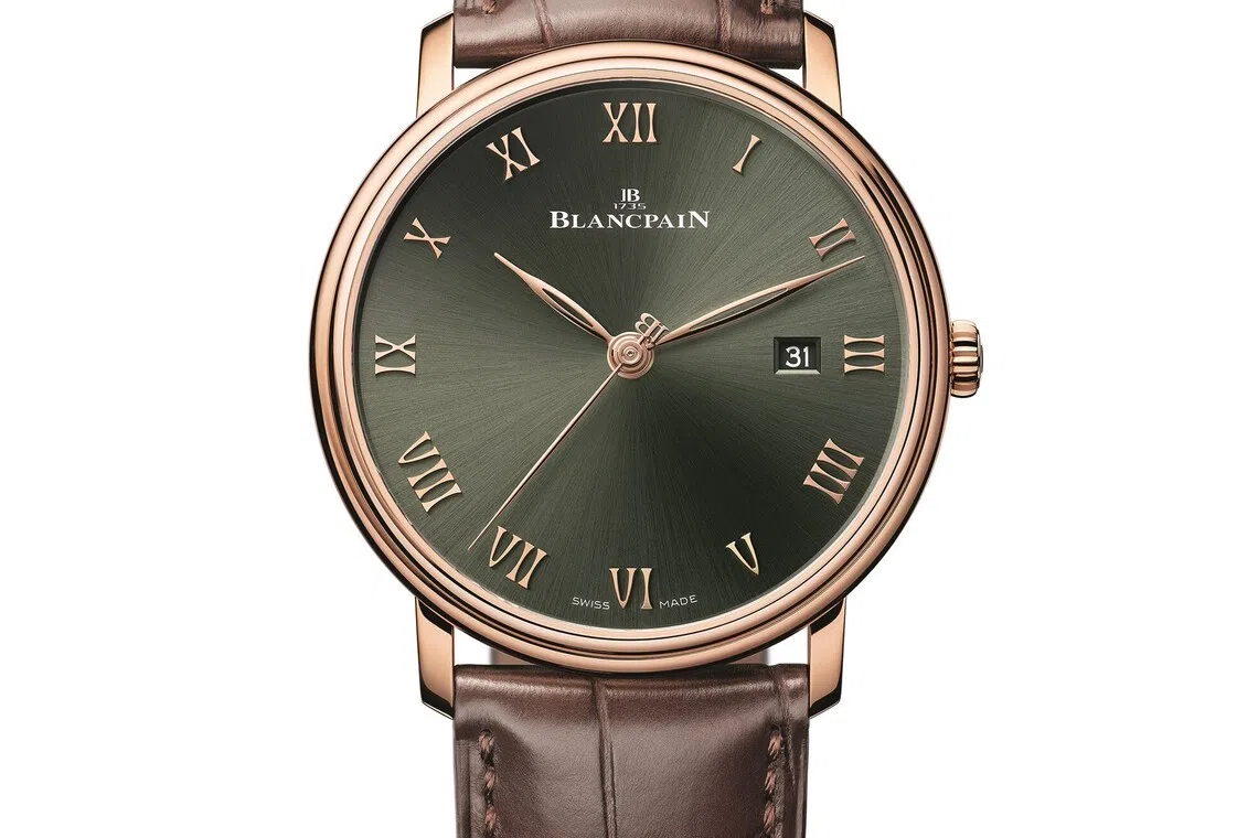 The Blancpain Villeret Extraplate with a sunburst green dial.