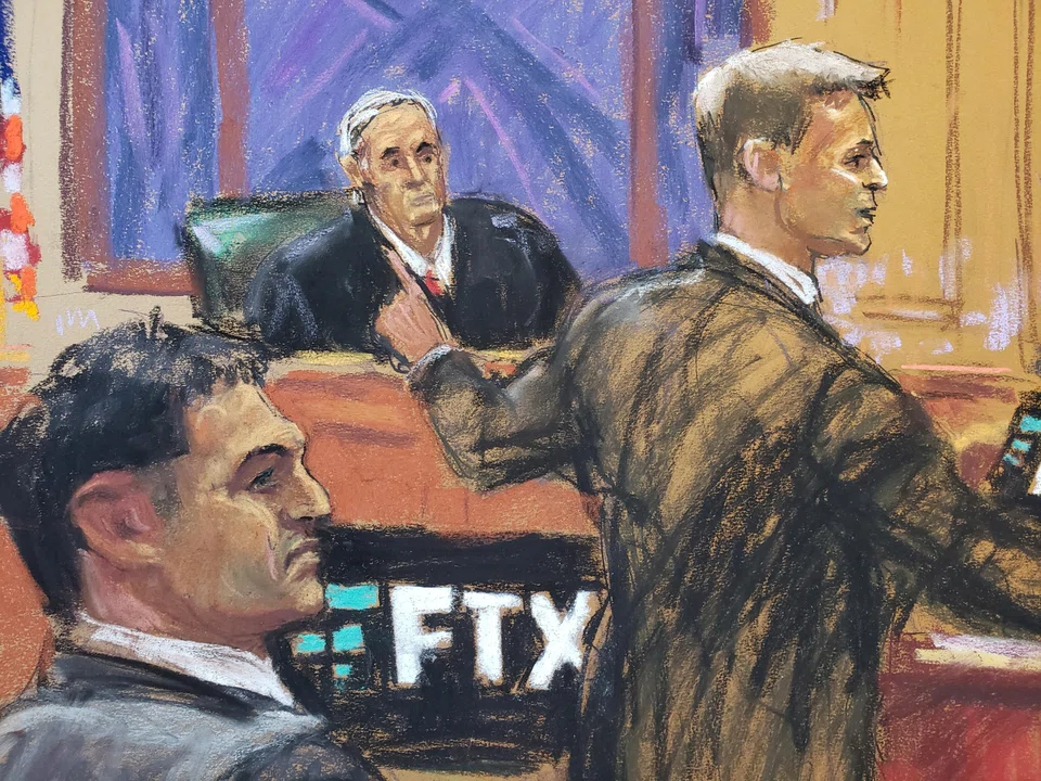 In a courtroom sketch, Sam Bankman-Fried watches as defence lawyer Mark Cohen makes his opening remark in Bankman-Fried's fraud trial over the collapse of FTX, in New York City, Oct 4, 2023.
