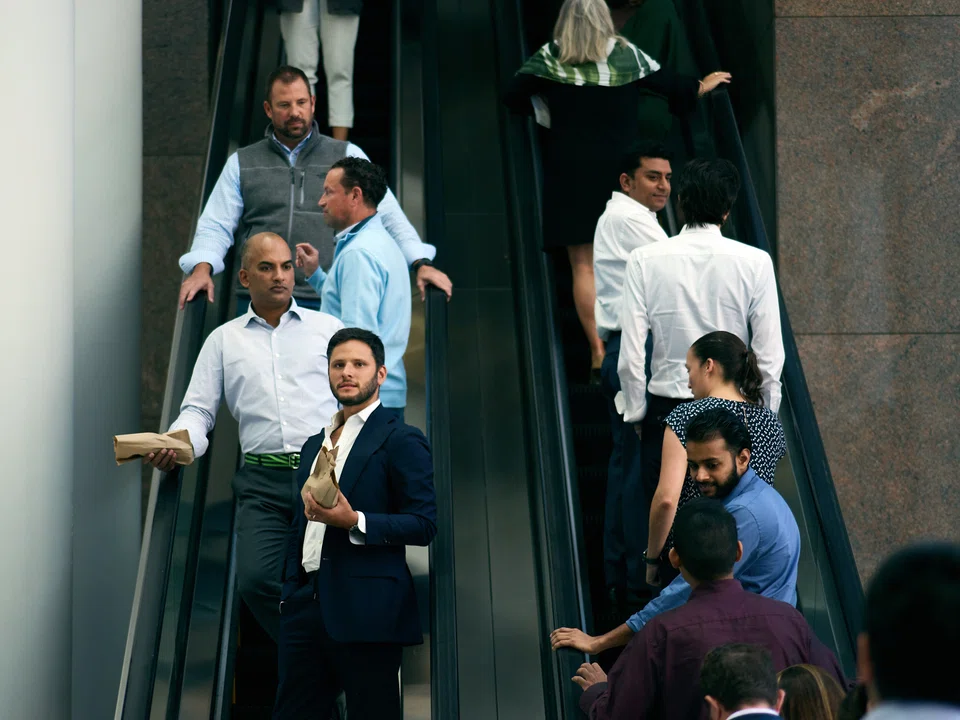 Did the pandemic affect men's office attire? Ensembles in lower Manhattan suggest not. Office workers at Brookfield Place, a vast office-mall complex in Manhattan's financial district, on Oct 10, 2022. 