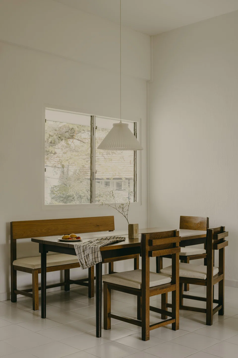The dining set was salvaged from a now defunct restaurant, and gives the home a period feel.