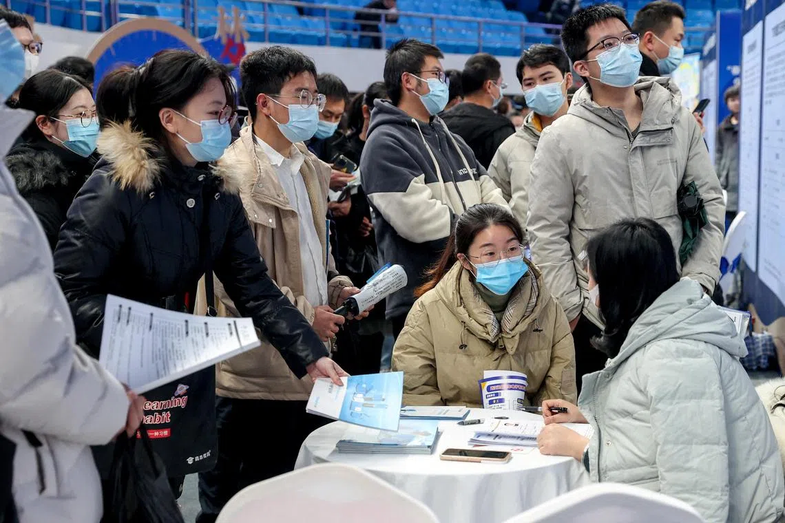 Chinese job seekers at a job fair in Wuhan, Hubei province, China, Feb 9, 2023. 