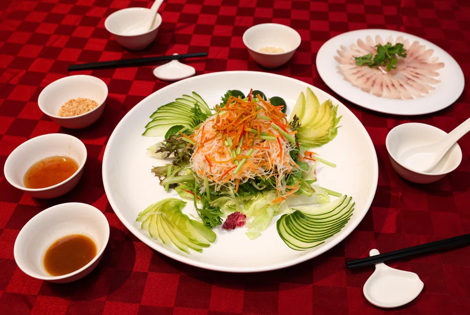 Teochew yu sheng drizzled with 98-year-old plum sauce.