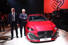 (From left) Renault Group CEO Francois Provost, Renault Brand CEO Fabrice Cambolive and chief design officer Laurens Van Den Acker pose with the new Renault Clio VI in Munich, Germany, Sep 8, 2025. 