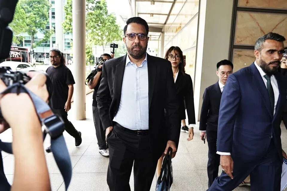 Workers' Party chief Pritam Singh (centre) returning to the High Court accompanied by lawyers Andre Darius Jumabhoy (right) and Aristotle Emmanuel Eng Zhen Yang (second fr right) on Nov 4.