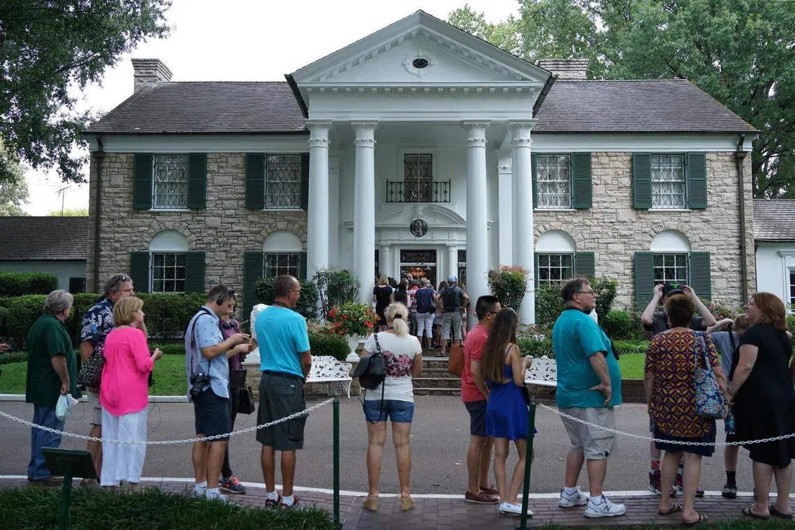 Visitors queue to enter the Graceland Mansion of Elvis Presley in Memphis, Tennessee, Aug 12, 2017. Lisa Jeanine Findley had falsely claimed that Elvis’s only child, Lisa Marie Presley, had pledged the historic landmark as collateral for a loan that she failed to repay before her death.