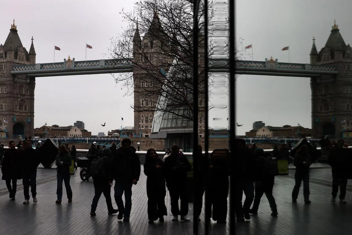 Pedestrians in the City of London on Dec 23, 2024.  Fundraising from London’s IPOs fell by about 9 per cent in 2024 to US$1 billion.