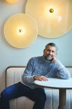 Before he left property consultancy JLL, Ashish Manchharam was its top investment sales broker. He wears a turtleneck pullover from Tod’s.