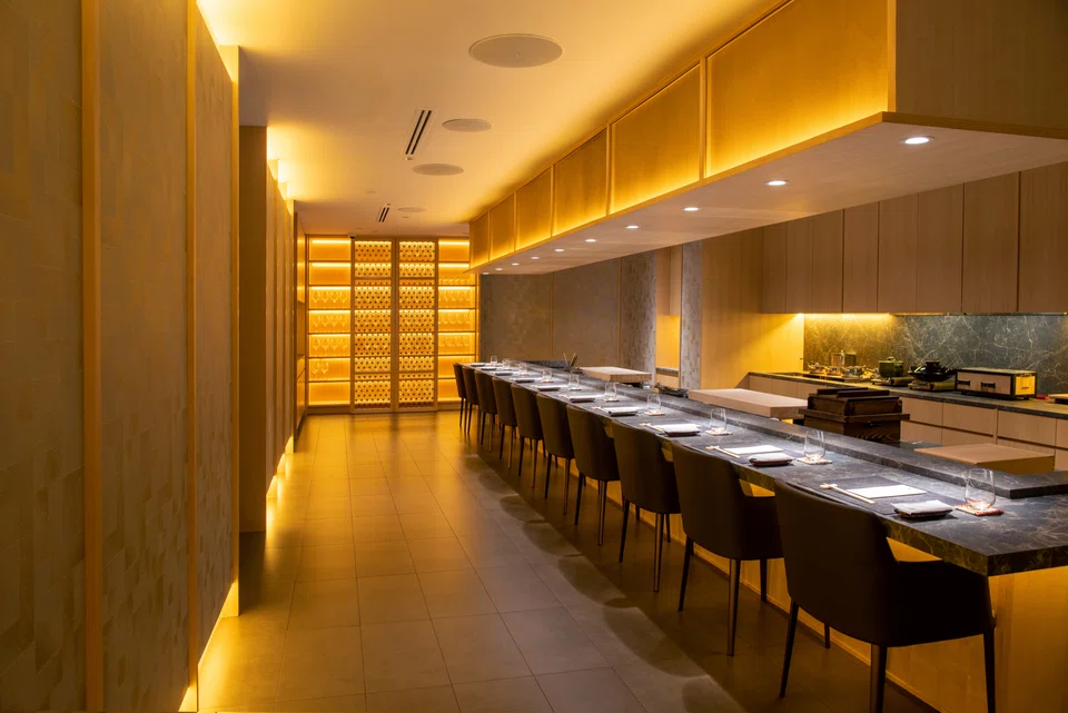 The inner sanctum of Jinhonten with a 10 seat counter and private rooms.