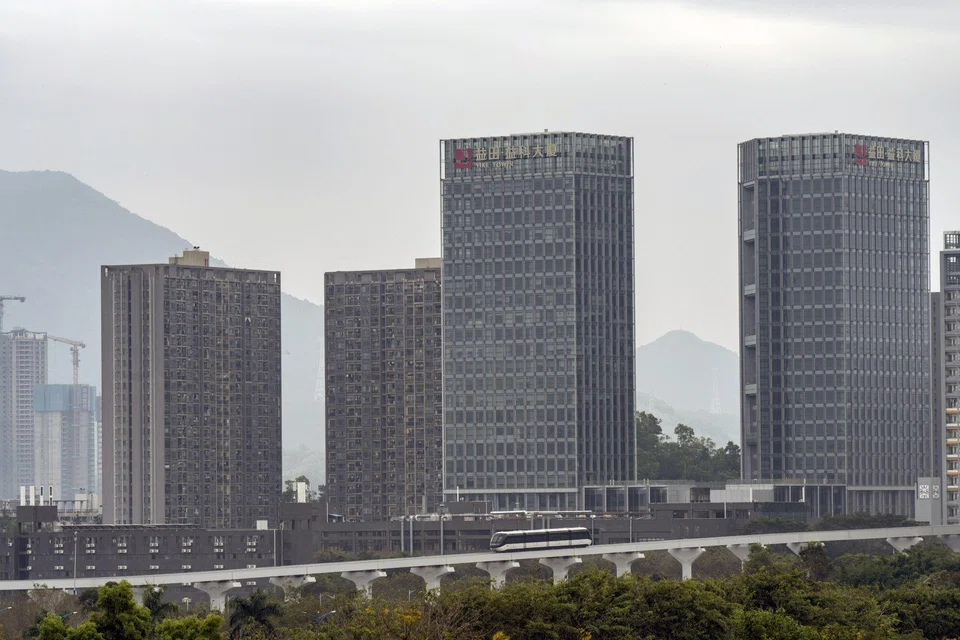 A growing number of young white-collar professionals are trading expensive, cramped quarters in Hong Kong for less pricey and roomier digs in Shenzhen (top).