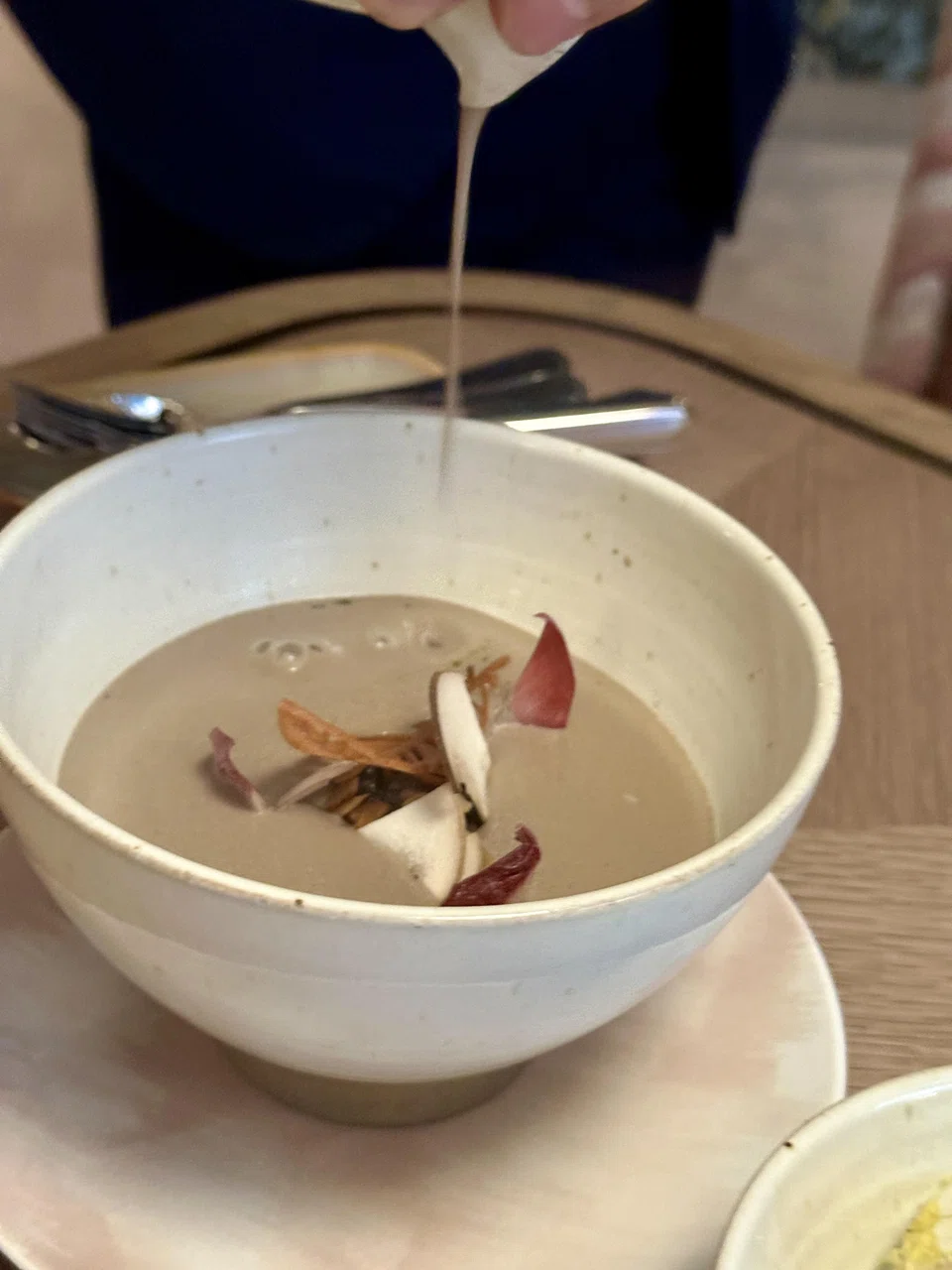 Heartwarming creamy mushroom soup made more hearty with a layer of savoury custard and sauteed mushrooms.