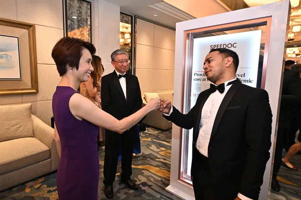 Minister of State for Trade and Industry Low Yen Ling with Shravan Verma, co-founder and chief executive of Speedoc. Speedoc is one of three top winners of the 2022 Emerging Enterprise Awards.