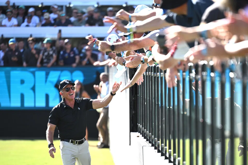 LIV Golf CEO Greg Norman greets spectators during the final round of LIV Golf Adelaide in Australia on Apr 28.