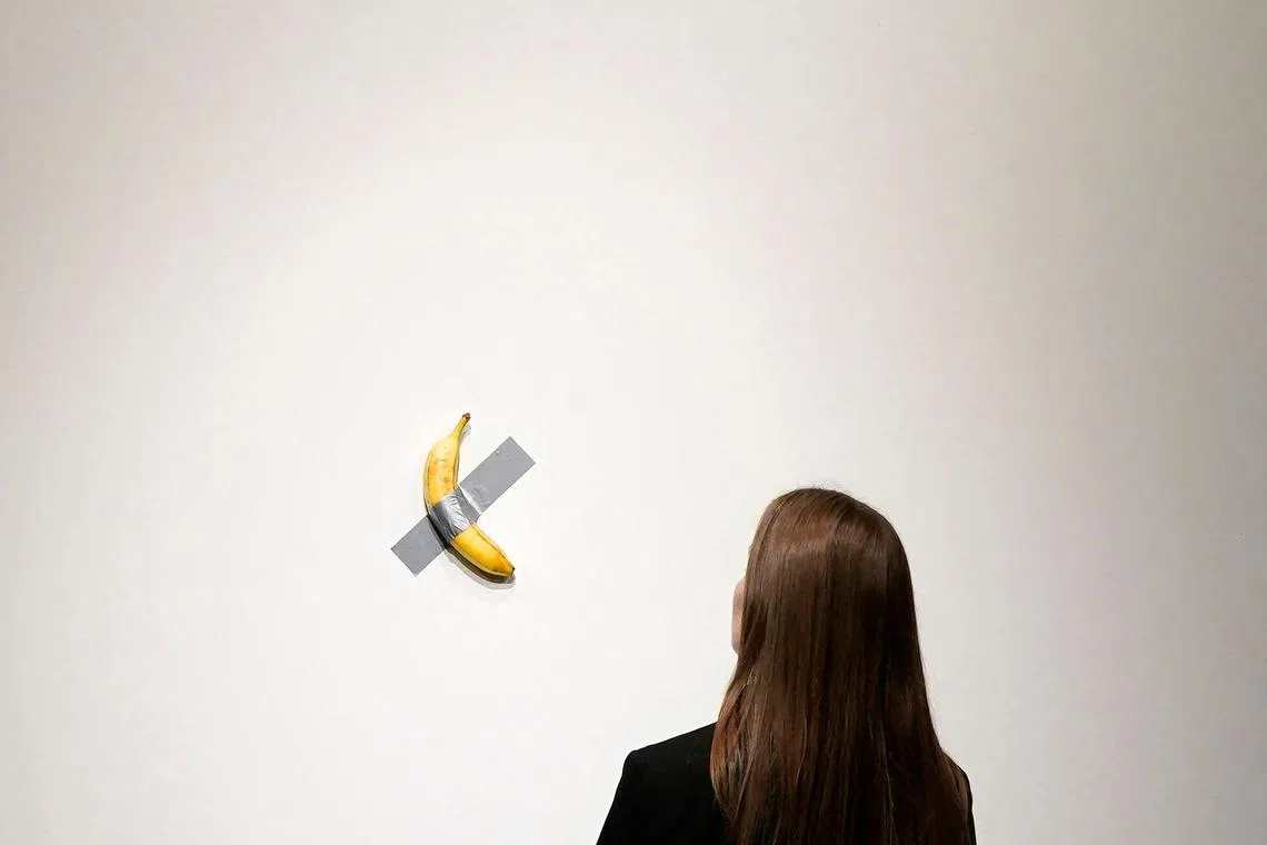 A fresh banana taped to a wall, a provocative work of conceptual art by Italian artist Maurizio Cattelan, was bought for US$6.2 million by a cryptocurrency entrepreneur at a New York auction.