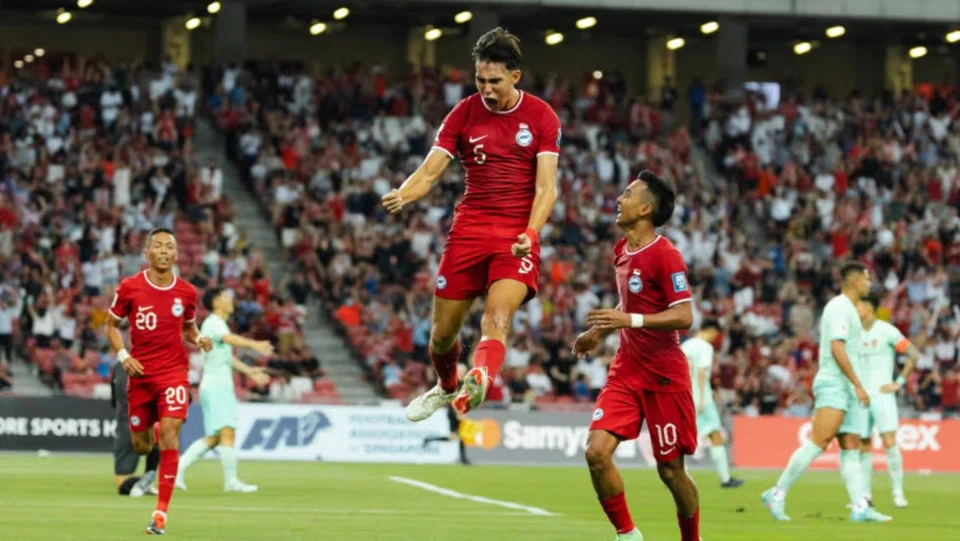 Singapore's Jacob Mahler celebrating after scoring the equaliser in his side's 2-2 draw with China in the 2026 World Cup qualifying game at the National Stadium on Mar 21.