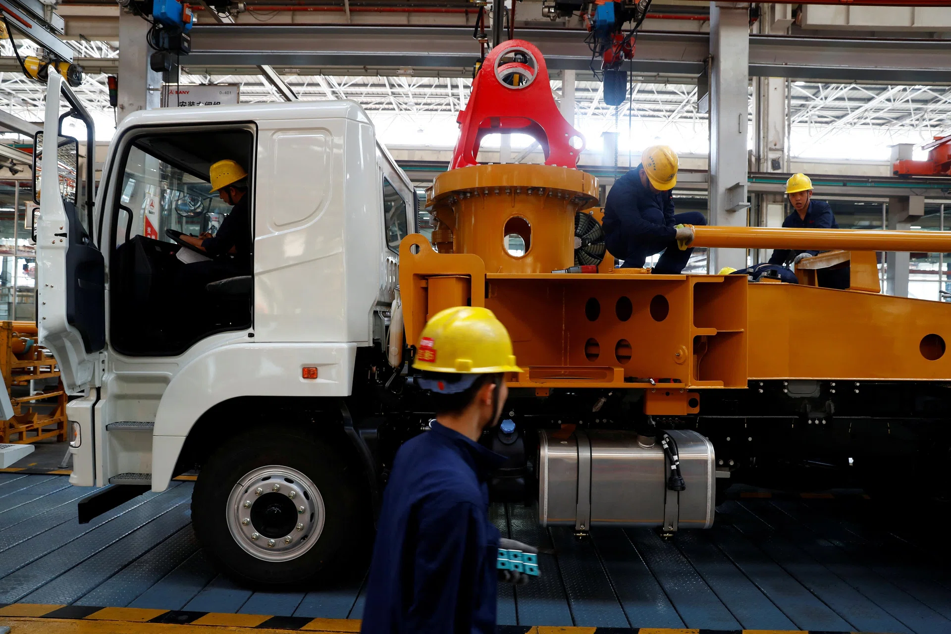 China industrial profits stay resilient as economy leans on factories, exports