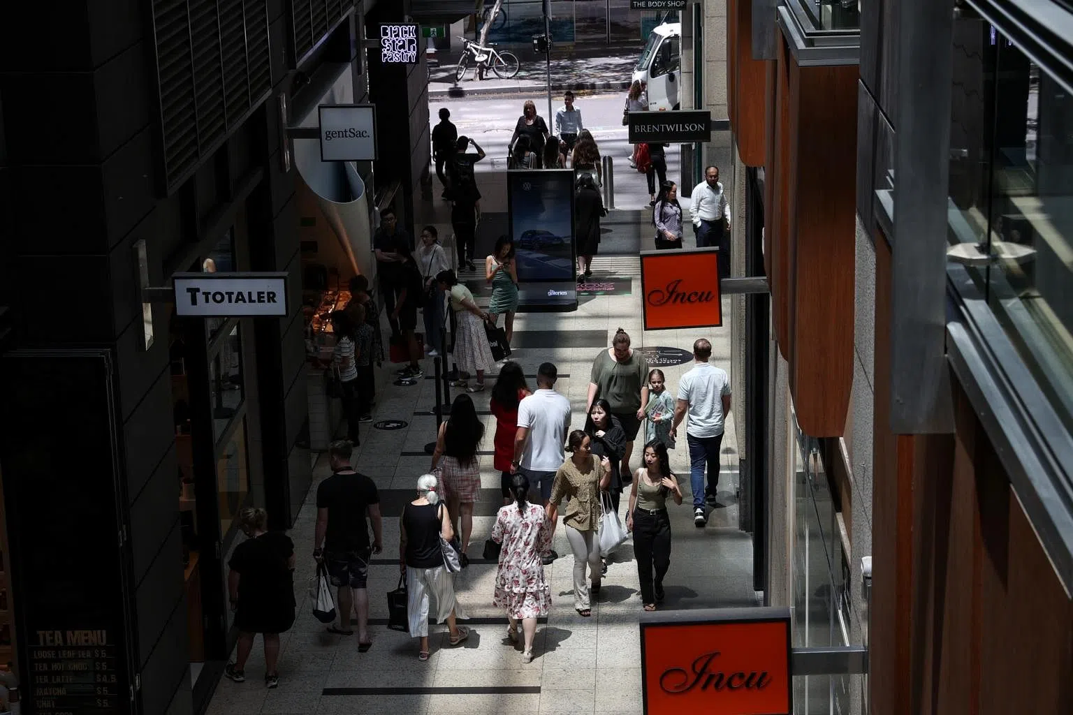 Australia shoppers pull back in December, outlook still strong