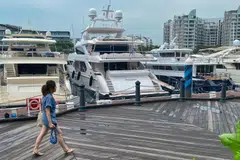 Su Haijin has partial ownership of a yacht named Family and has substantial wealth overseas. 