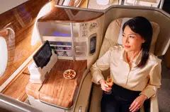 Business Class travellers can unwind with ample personal space, on-demand refreshments and a welcome glass of champagne before settling in for the flight.