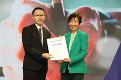 Bryan Tan, one of the three winners of the St Gallen Symposium’s annual global essay competition, with Grace Fu.