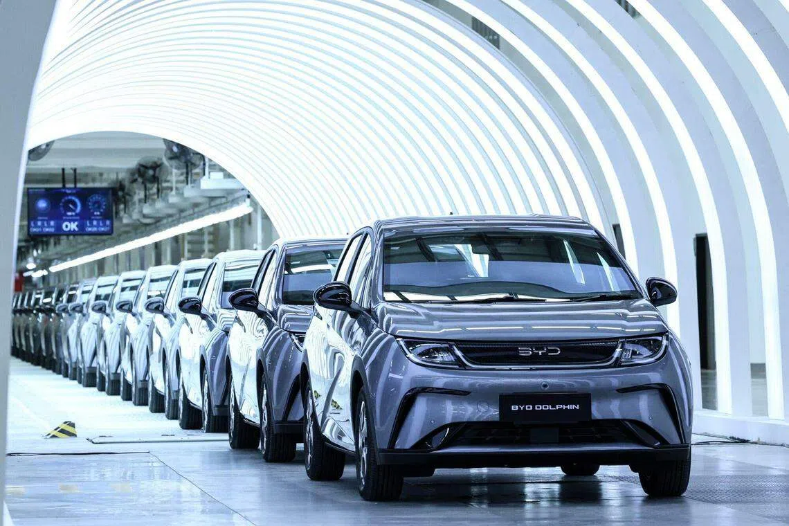 BYD Co. Dolphin compact hatchback electric vehicles at the launch of the company's new plant in Nikhom Phatthana, Rayong province, Thailand, on Thursday, July 4, 2024. BYD's shares have defied