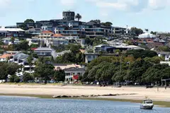 Above: Residential properties in Auckland, New Zealand. In the third quarter of 2025, the country's economy grew 1.3% year on year.
