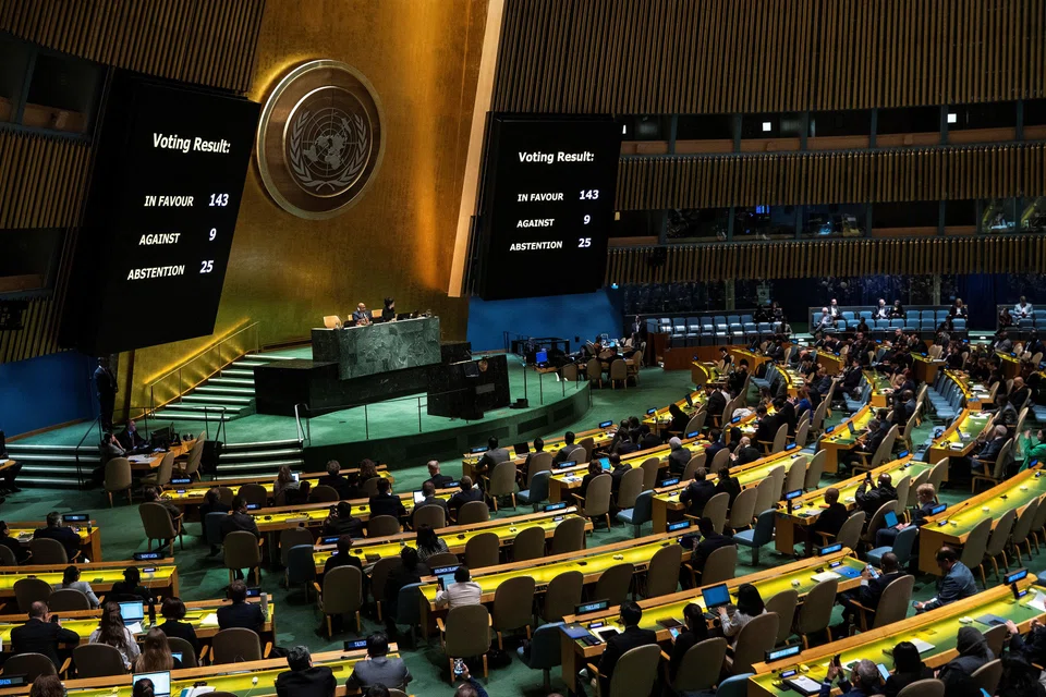 Screens show the voting result during the United Nations General Assembly vote on a draft resolution that would recognize the Palestinians as qualified to become a full UN member.
