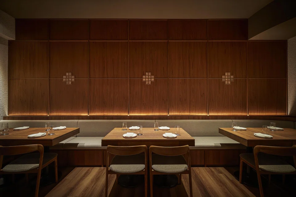 GU:UM's warm, woodsy interiors.