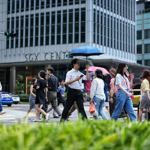 Singapore firms to dial back on raises, bonuses: survey