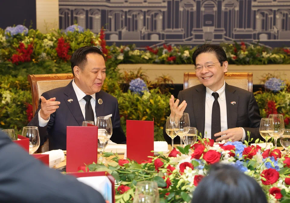Singapore Prime Minister Lawrence Wong (right) with his Thai counterpart Anutin Charnvirakul at an official lunch, where fried Hokkien mee – a dish the Thai leader enjoys – was served.