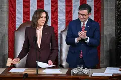 US Vice-President Kamala Harris hits the gavel after reading the vote totals as Speaker of the House Mike Johnson looks on during of a joint session of Congress to certify the results of the 2024 Presidential election, Washington, DC, Jan 6, 2025.