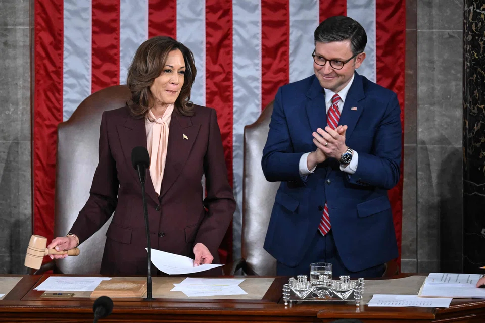 US Vice-President Kamala Harris hits the gavel after reading the vote totals as Speaker of the House Mike Johnson looks on during of a joint session of Congress to certify the results of the 2024 Presidential election, Washington, DC, Jan 6, 2025.