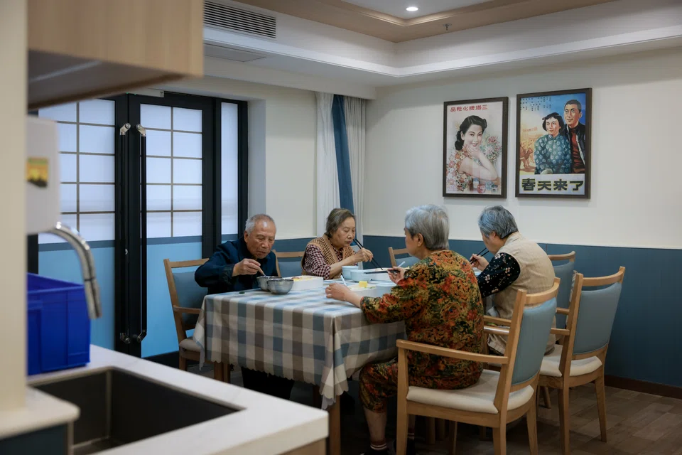 Elderly residents having breakfast at the Perennial Alzheimer’s Care Village in Xi'an, China. The company hopes to apply the learnings to its upcoming assisted living project in Singapore