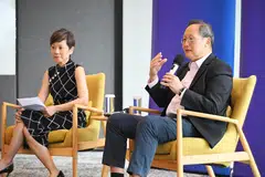 Manpower Minister Tan See Leng (right) with KPMG Singapore's managing director Lee Sze Yeng, during his visit to the professional services firm on Mar 28.