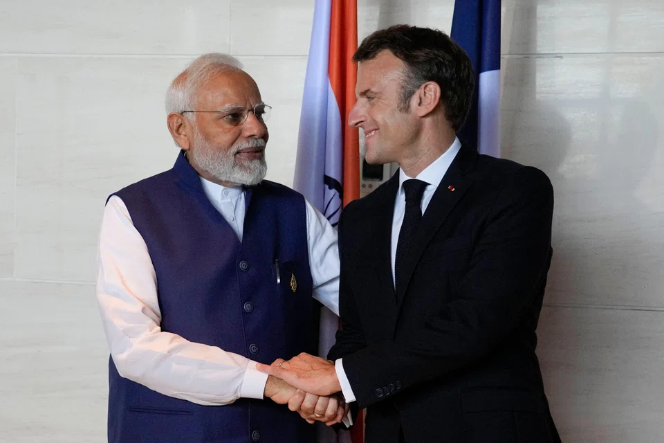 Indian Prime Minister Narendra Modi (left) with French President Emmanuel Macron. Modi will be the guest of honour at Bastille Day celebrations in Paris on Jul 14.